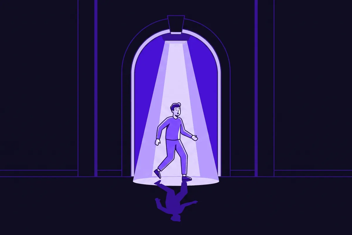 A single spotlight built into a doorway snaps on and freezes a passerby mid-step, caught red-handed, while the rest of a vast hallway stretches out dark, unlit, and empty on either side
